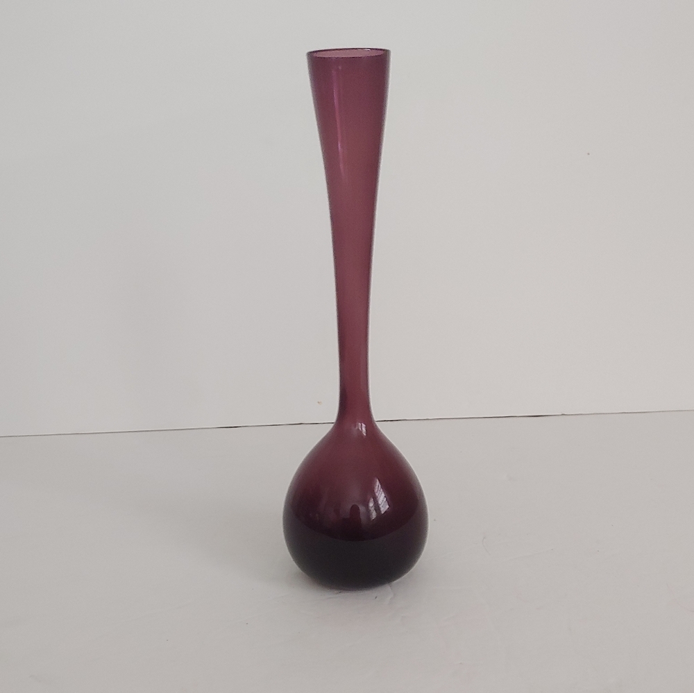 Purple small glass vase.